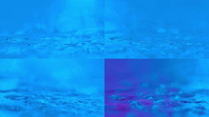 彩色表面上的水滴舞台背景动态动画虚化