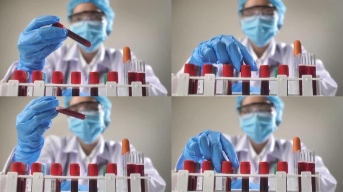 亚洲科学家在实验室检查血液