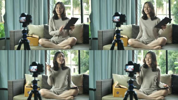 亚洲年轻女性博客在社交媒体概念上在家录制vlog视频在线影响者。直播病毒