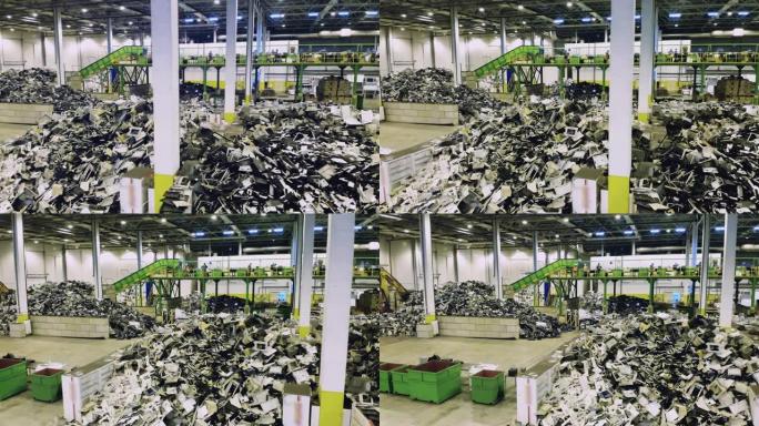 大型垃圾场中的成堆垃圾。回收工业概念，塑料垃圾回收工厂。