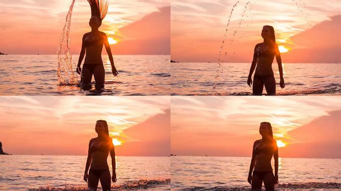 女人站在海洋中，向后翻转湿头发