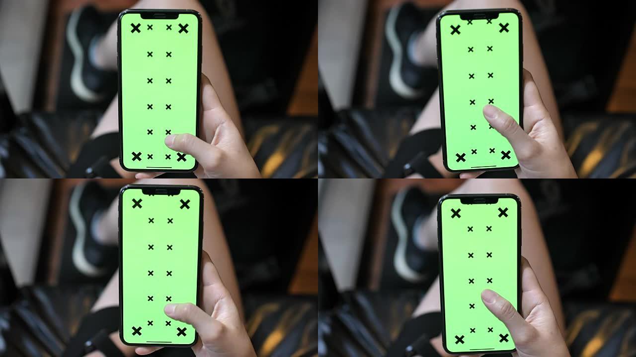 女人用手机绿屏显示