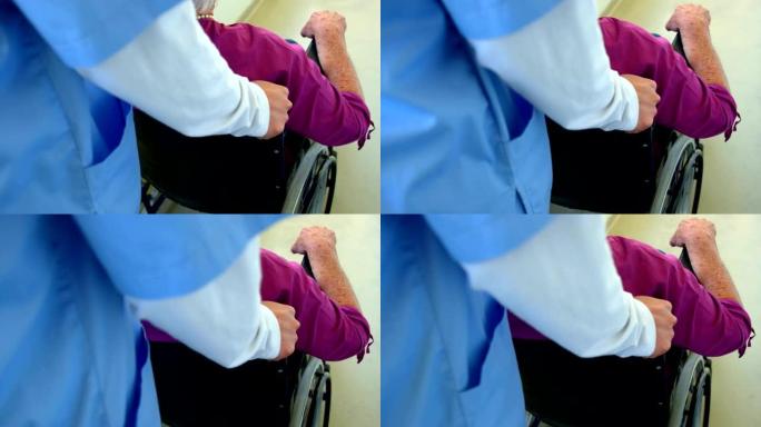 高加索女医生在养老院4k轮椅上推老年患者的特写