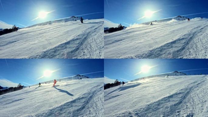 在阳光明媚的日子里滑雪。休闲活动