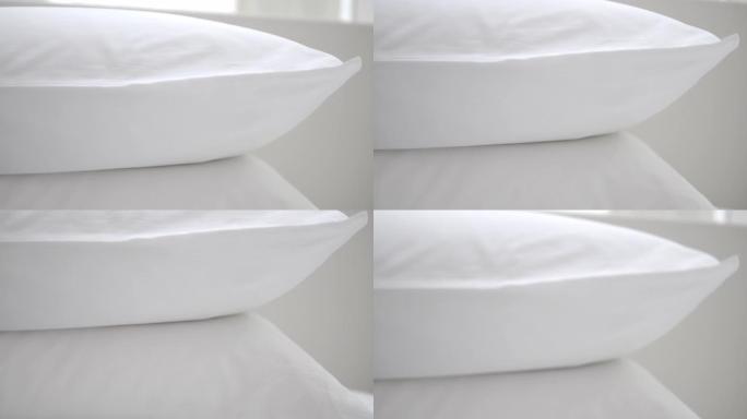 床上干净舒适的白色枕头