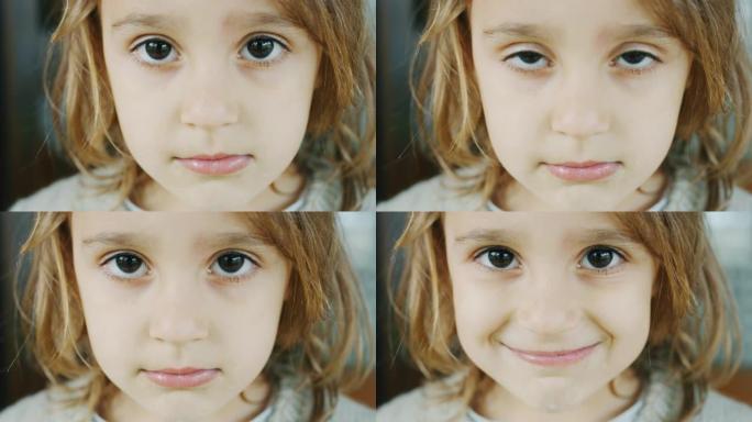 可爱的小女孩在镜头前微笑，屋外牙齿腐烂的真实照片