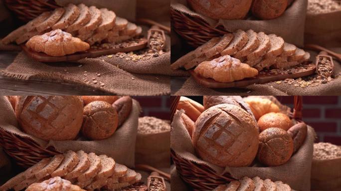 在质朴的木制工作台上新鲜出炉的美味面包，具有复制空间，健康饮食理念。