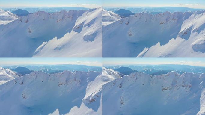 空中: 飞向阿尔卑斯山白雪覆盖的山顶。