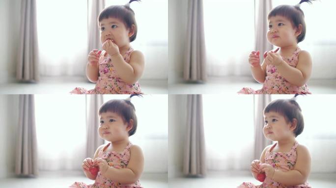 小女孩吃草莓邋遢，慢动作