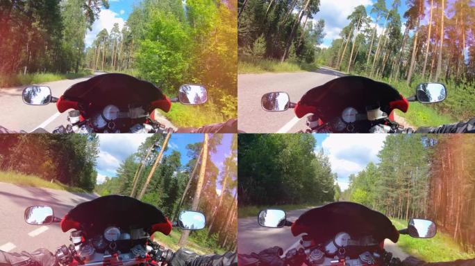 森林路，摩托车在第一人称视角行驶。视点。骑自行车的人沿着乡间小路骑行。