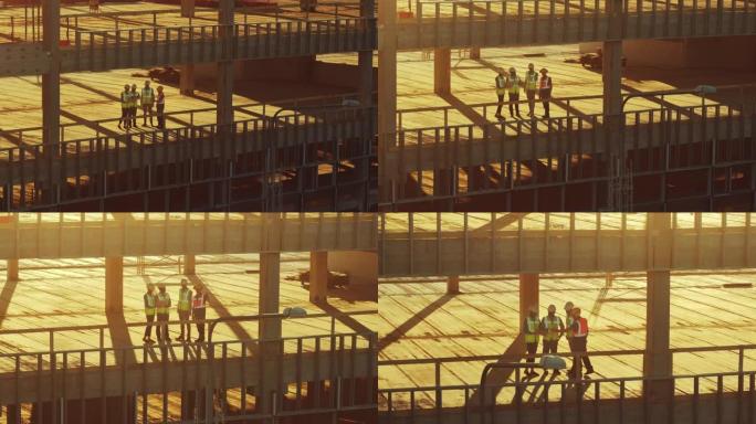鸟瞰图: 不同的专家团队检查商业、工业建筑/摩天大楼模板施工现场。由土木工程师，投资者，建筑师和工人