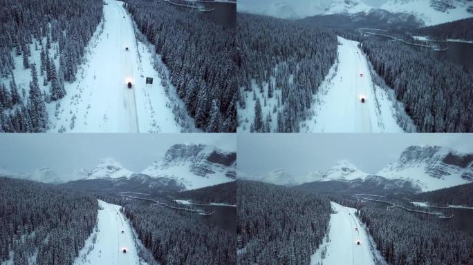 空中雪道夜行雪地行驶汽车防护林视频素材