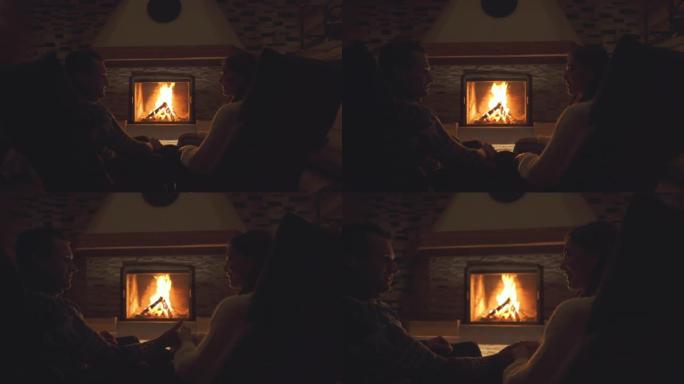 坐在壁炉旁的幸福夫妻