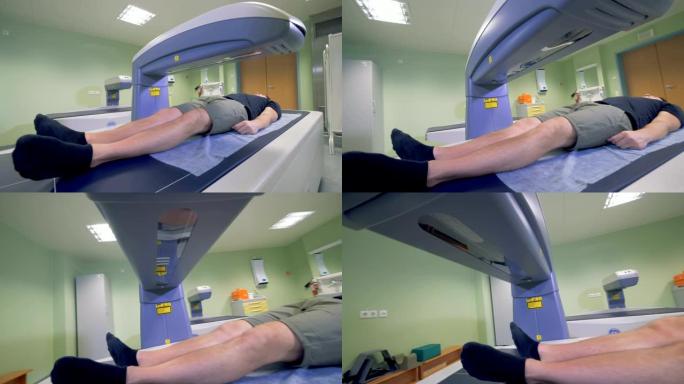 体层摄影机在病人身上起作用。MRI, CT, PET扫描仪工作。