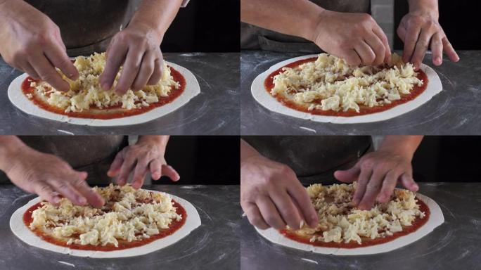 厨师在比萨店准备披萨时将磨碎的奶酪放在面团上做饭