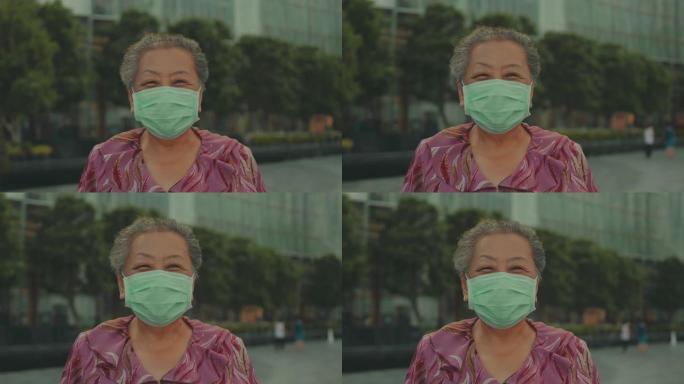 新常态: 戴着防护医用口罩的亚洲高级女性