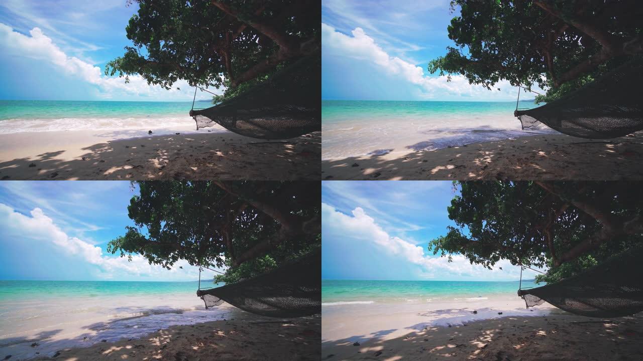 树下有吊床的天堂海滩