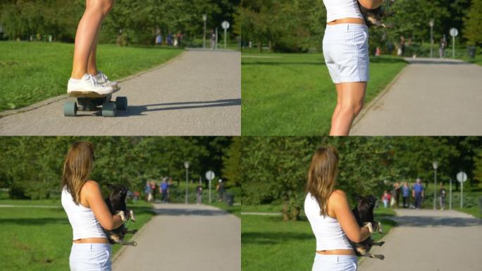 特写: 女孩骑着电子滑板穿过公园，抱着她的小狗。