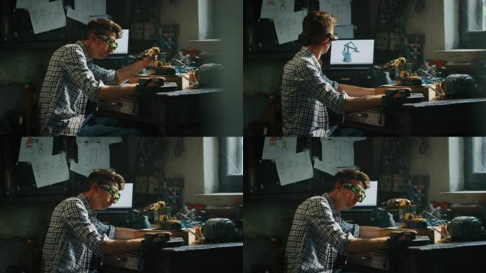 一位年轻的专业工程师的慢动作正在他的车间中进行创新技术机械臂的投影