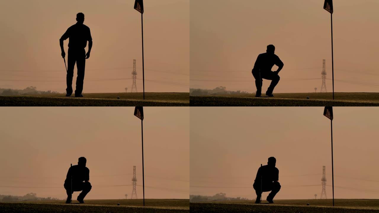 高尔夫球手的剪影在夏天横扫并保持高尔夫球场，以放松身心。日落时的剪影高尔夫球手