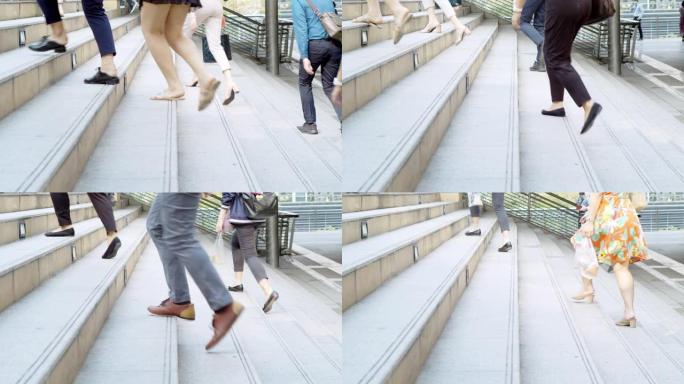 慢动作场景人群的脚亚洲人在城市街道上走上楼梯