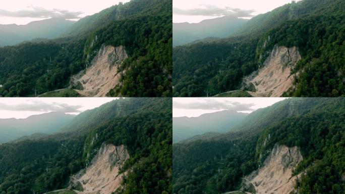 空中4k视图。黄昏时飞越美丽的山脉。强大的悬崖和峡谷