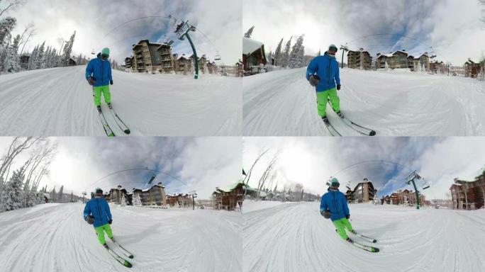自拍照: 滑雪者在滑雪胜地旅馆之间沿着修饰的斜坡巡游