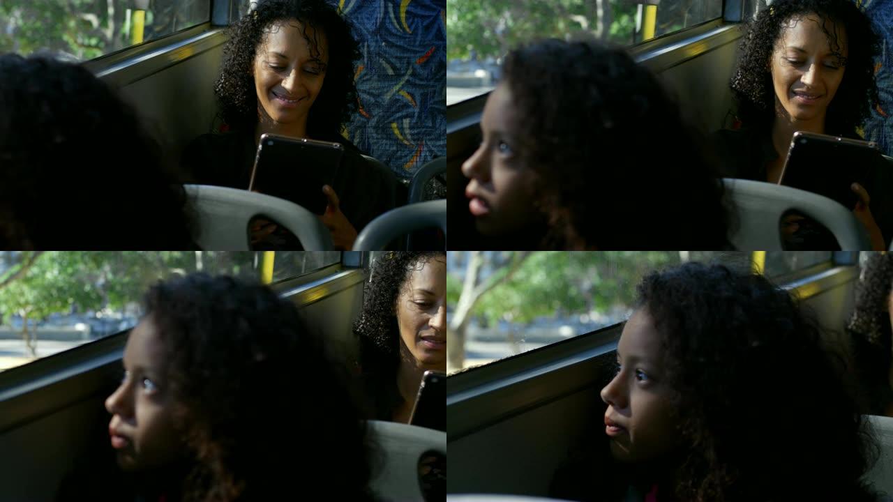 乘坐4k公交车时使用数字平板电脑的女性通勤者