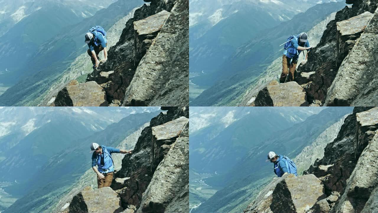 岩壁上的登山者。高加索山脉