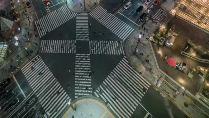 鸟瞰人行交叉路口人行横道银座人行横道在东京市夜间行驶的4k时间流逝。日本，日本文化观念