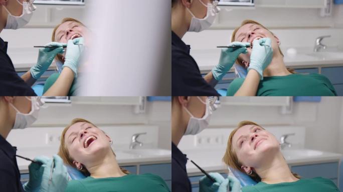 牙医用医疗工具检查年轻女子