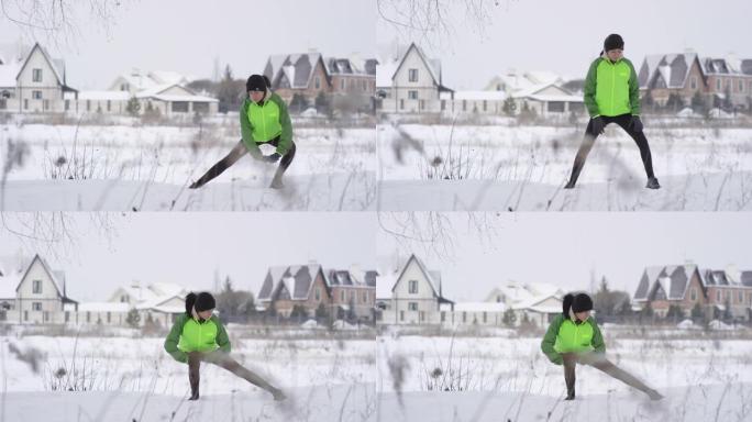 女人在冬天在户外做侧面弓步