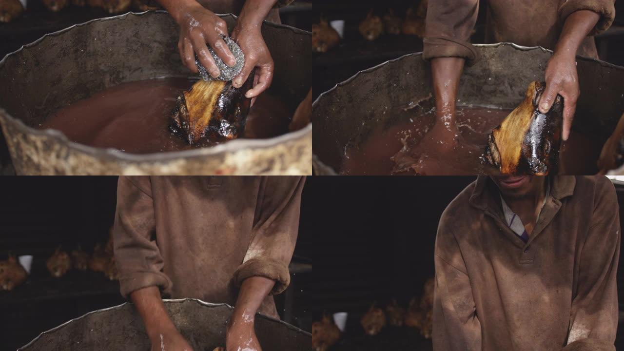 非洲男子洗肉