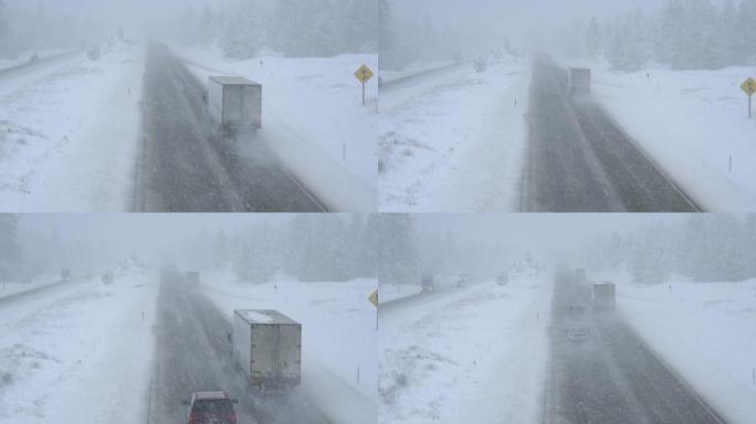 卡车和汽车沿着危险的乡间小路穿过暴风雪