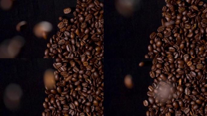 咖啡豆落在咖啡堆上