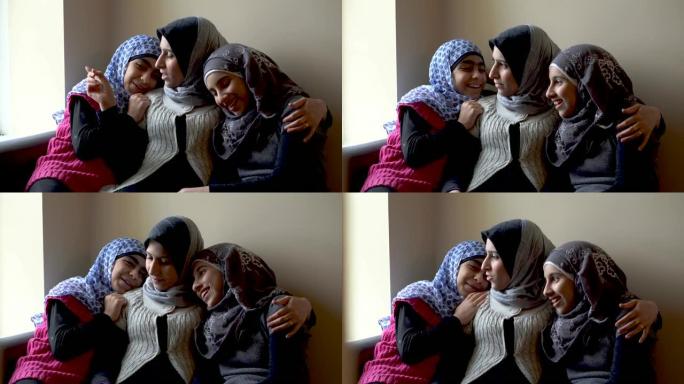 穆斯林母亲和美丽的青春期女儿一起大笑