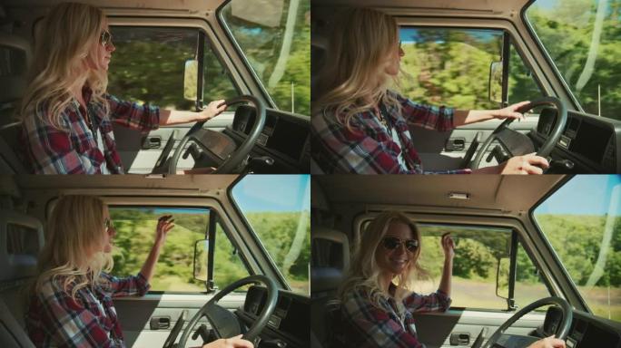 微笑的女人在暑假开车