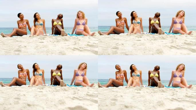 混血女性朋友在海滩上闭上眼睛放松的前视图4k