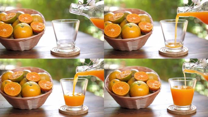 橙汁新鲜水果与绿色自然背景