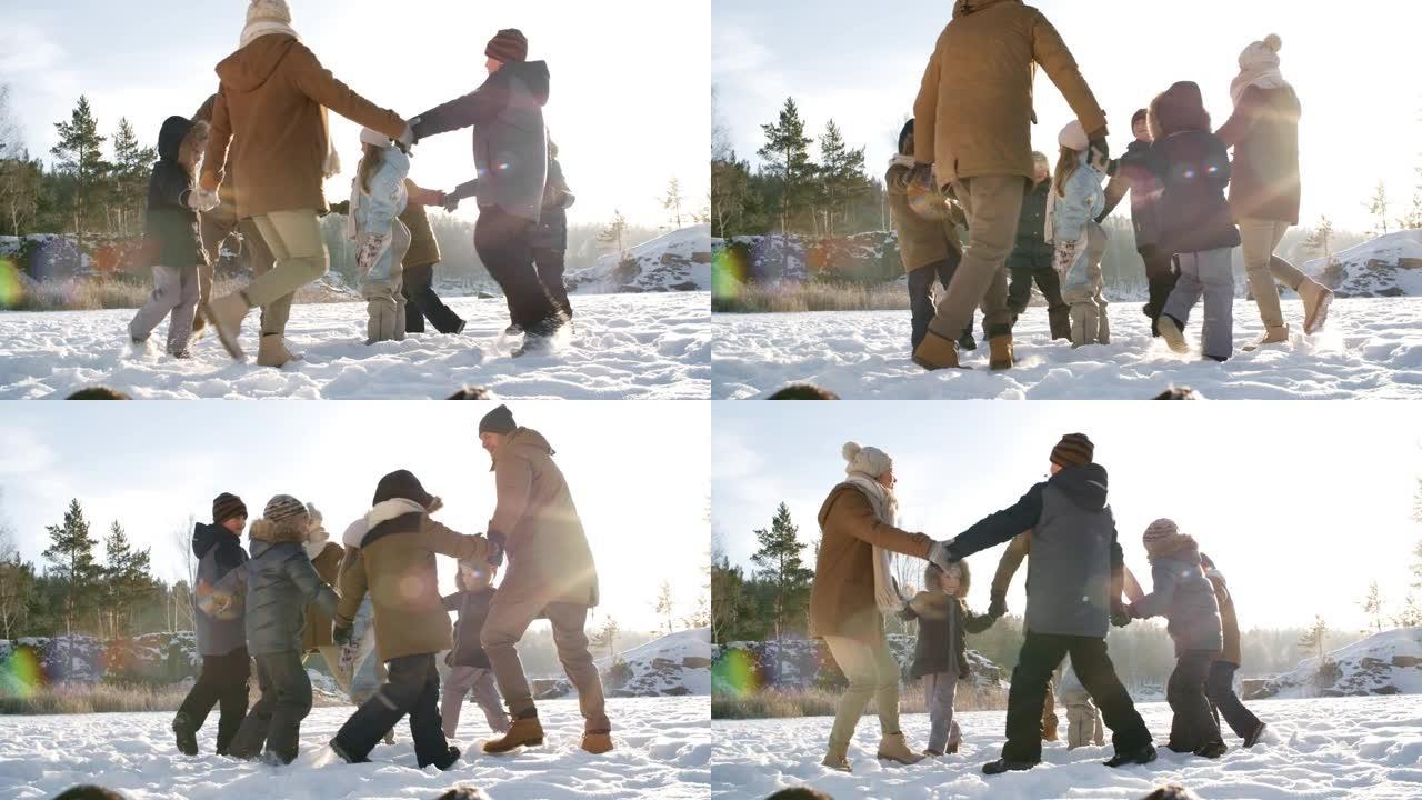 家人在雪地里跳圈舞