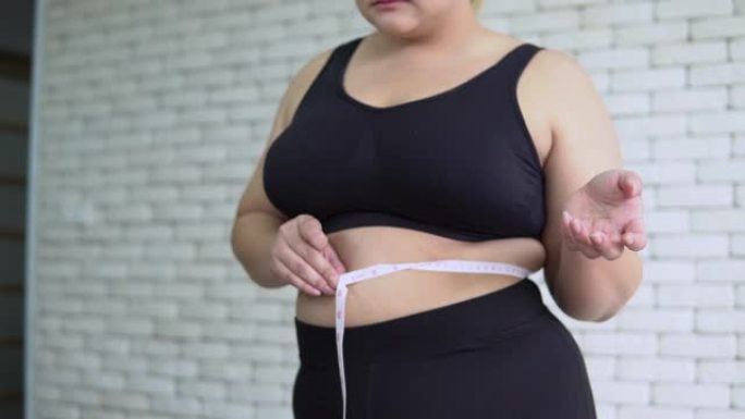 测量腹部周长减肥瘦身肥胖女子女士妇女