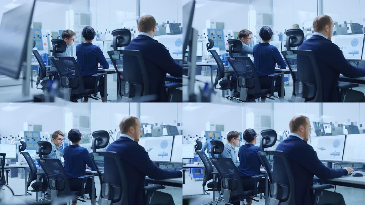 现代工厂: 女项目主管与一位从事计算机工作的男性工业工程师交谈。他们使用cad软件进行设计、开发。背