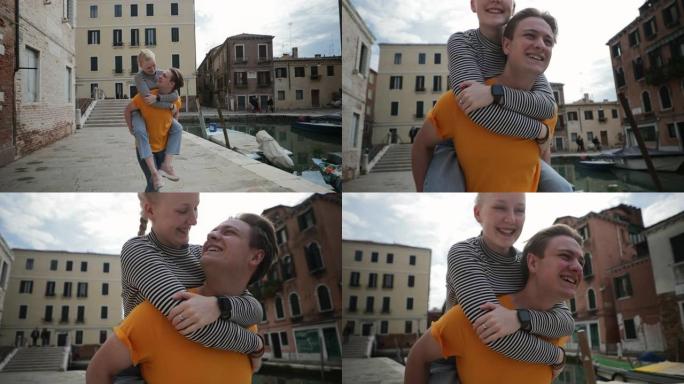 威尼斯的背负式外国情侣外国人夫妻开心快乐