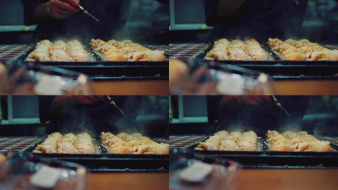 厨师烹饪日本食物章鱼烧