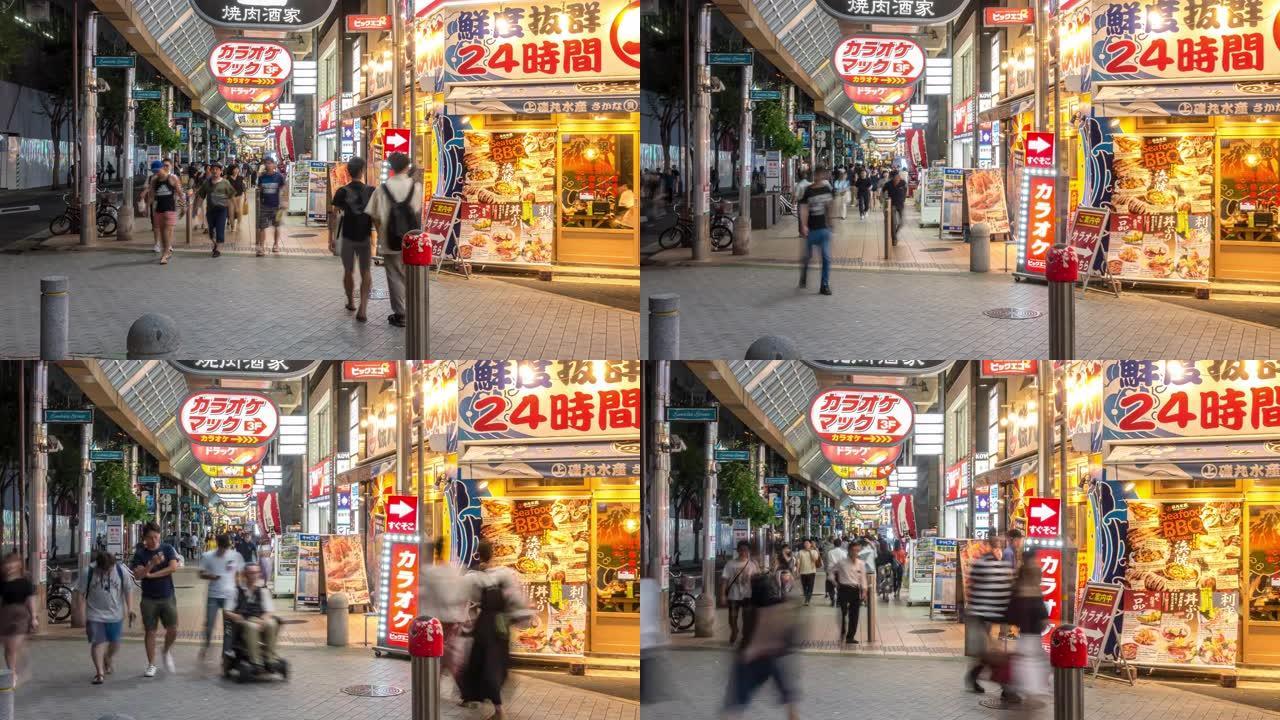 延时: 夜间在日本神户三宫购物街拥挤的游客行人