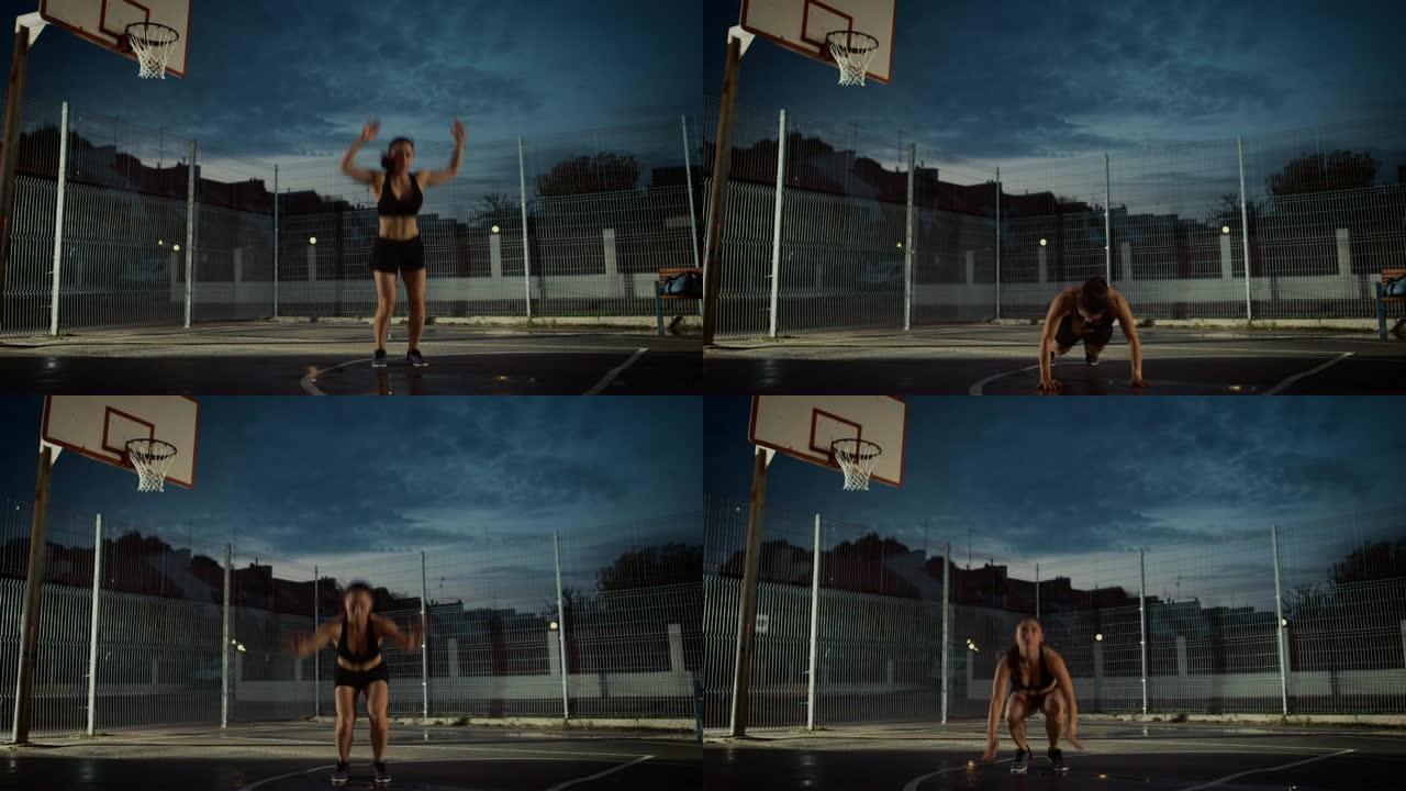 美丽精力充沛的健身女孩做杰克·伯皮练习。她正在一个有围栏的室外篮球场里锻炼身体。居民区下雨后的晚间录
