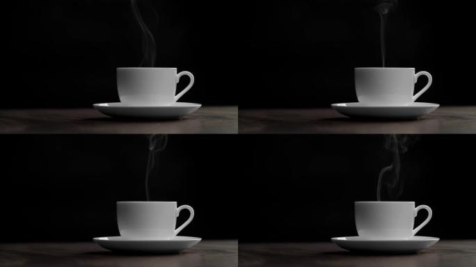 白茶或咖啡杯和茶托在黑色背景的木桌上。蒸汽烟雾从杯子里冒出来。UHD