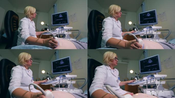 女医生正在做孕妇的超声检查