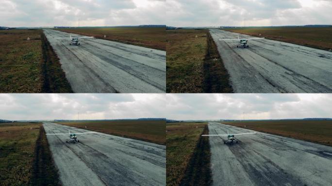 一架喷气式飞机在沿起飞跑道移动时加速行驶