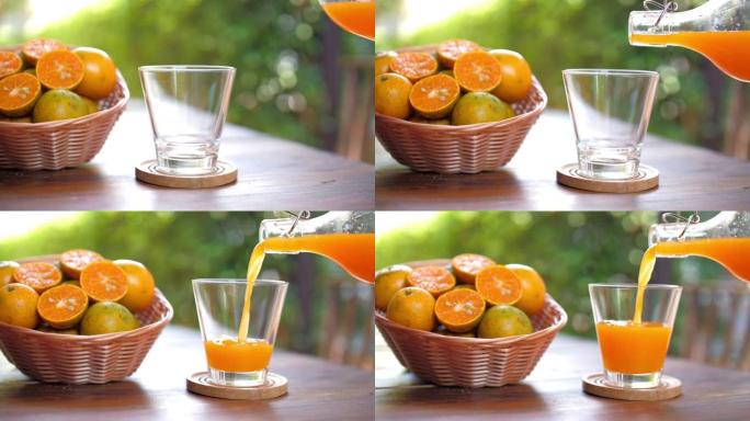 将新鲜的橙汁倒入玻璃杯中，慢动作